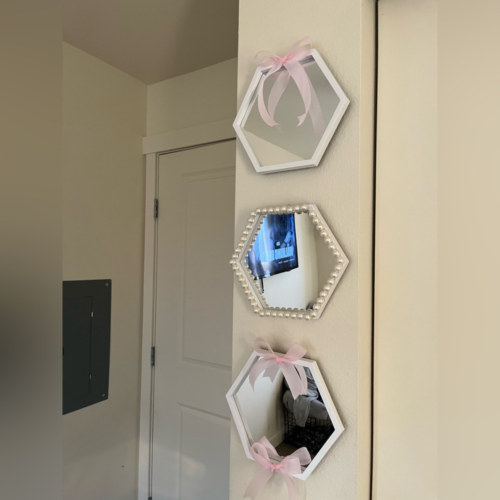 Hexagonal White Wall Mirrors with Pink Ribbon